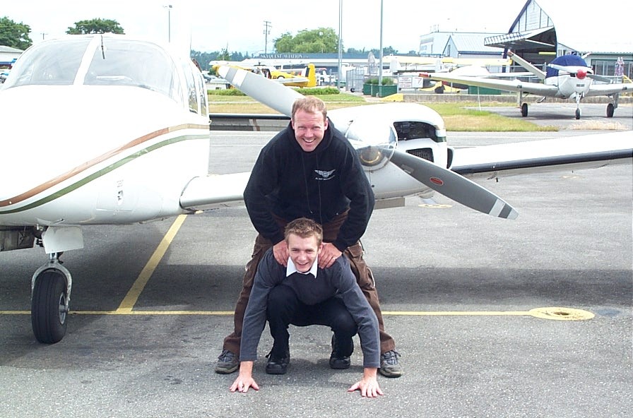 Commercial Pilot Graduate Tim Sawasky, now a Beech 1900 First Officer with Central Mountain Airways, with his Flight Instrutor, now Twin Otter Captain, David Woollam.  Langley Flying School.